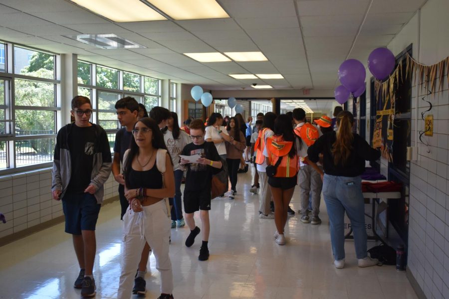 The incoming freshmen rush into the Niles West hallways for the first time as Wolves!