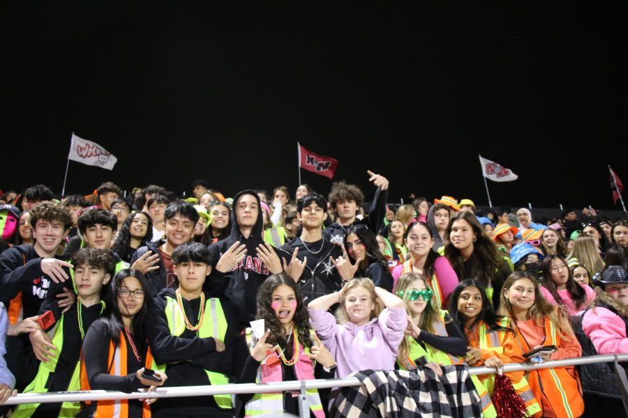 Upperclassmen section showing their spirit by wearing neon.