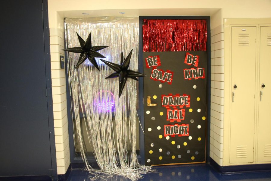 Student Services shows their spirit and gives an important reminder before the dance.