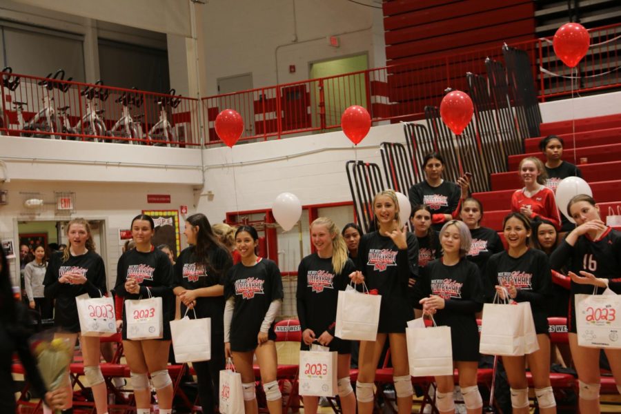 Underclassmen wait for the Seniors to come out to receive their gifts. 