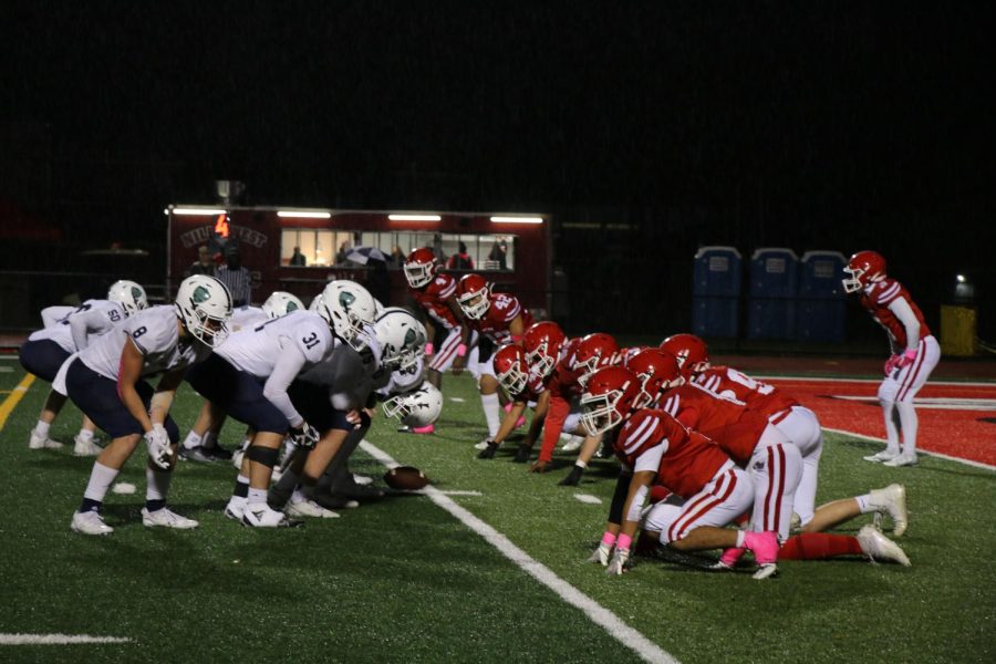 Niles West and New Trier face off and try to defend the touchdown zone, so New Trier doesnt get a lead.