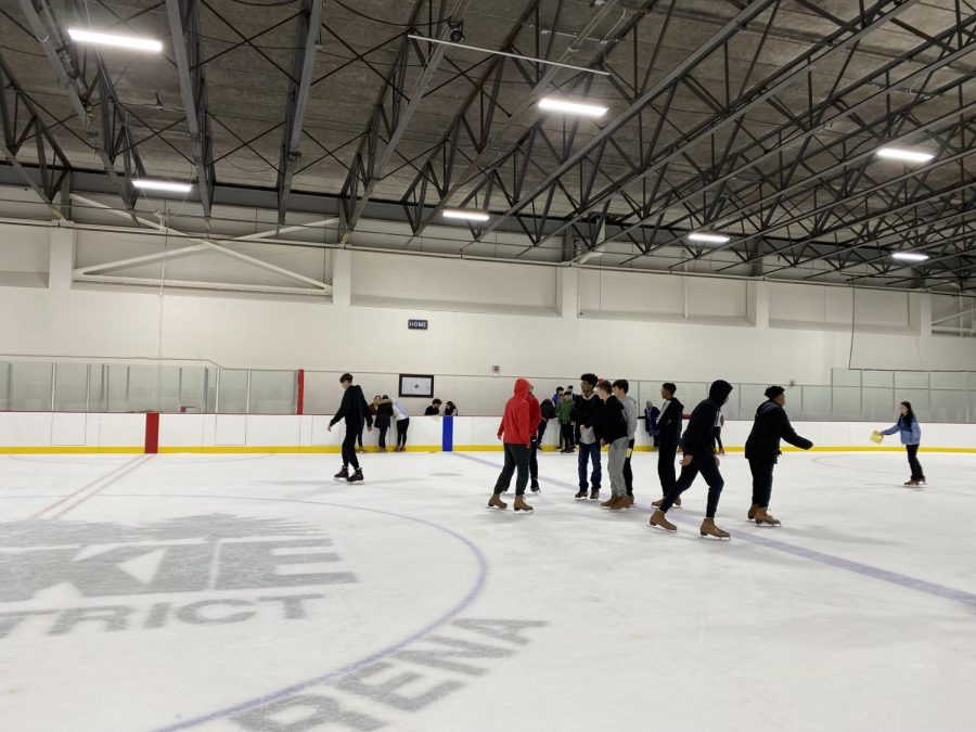 Niles West physics students ice skate in the Weber Center ice rink.