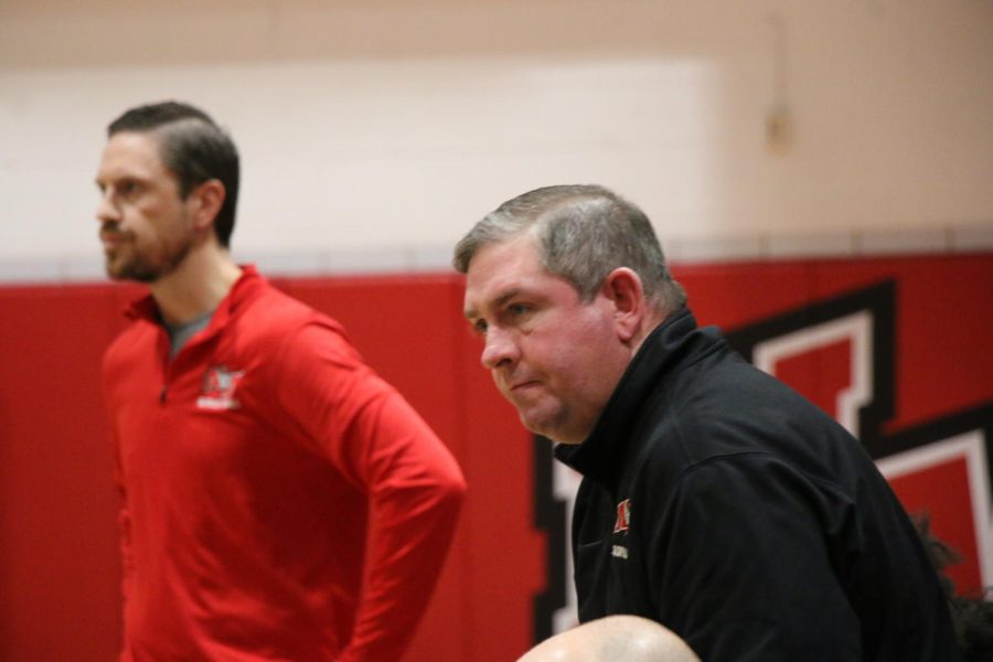 Coaches Krakenburger and Wasielewski are upset about a bad play.