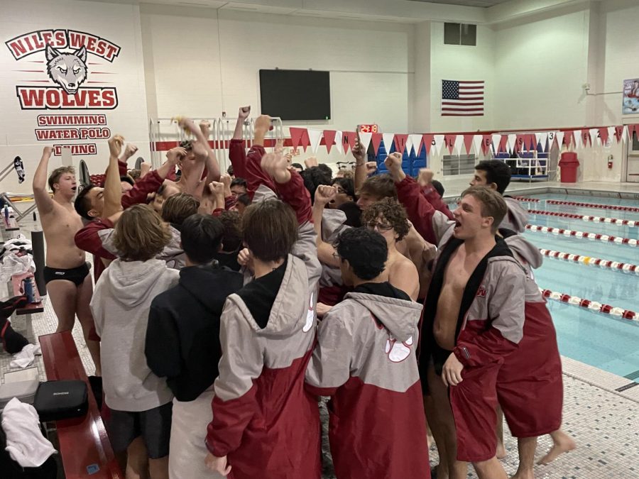 The Niles West Boys Swimming and Diving team gather up their spirits Friday night, but not just for the upcoming weekend, but for the meet against Niles North.