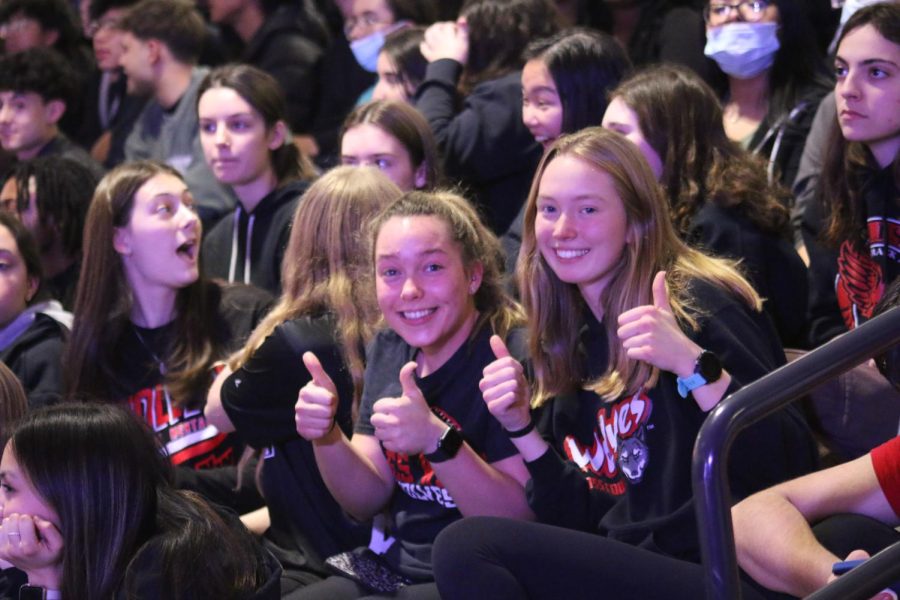 Juniors Nora Schmidt and Nora Graham smile after participating in the pep assembly. 