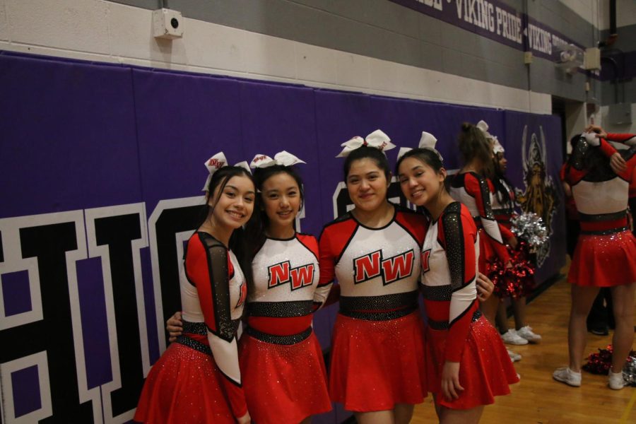 Niles West cheerleaders smiling big for the big game 