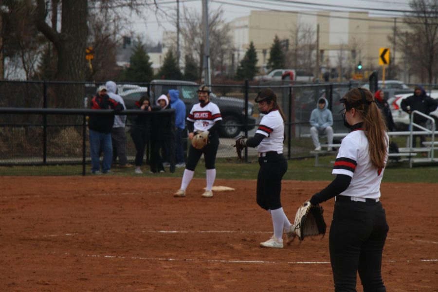 Wolves stay on their toes, waiting for senior Maggie Burns to throw the ball. 
