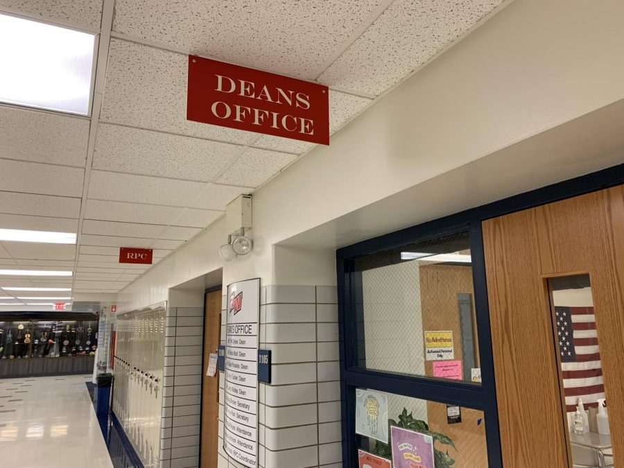 Deans office sign. 