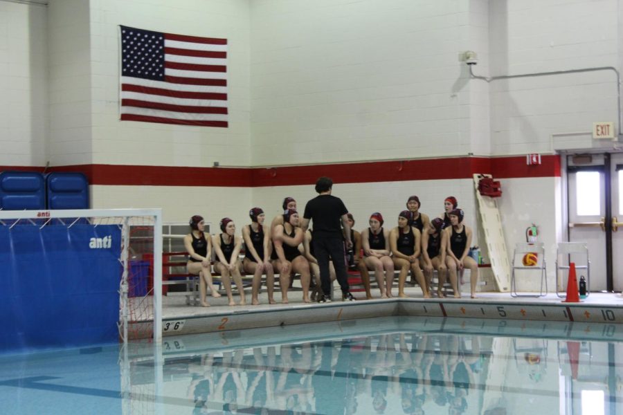 The water is still before the game begins, as Block talks to the girls. 