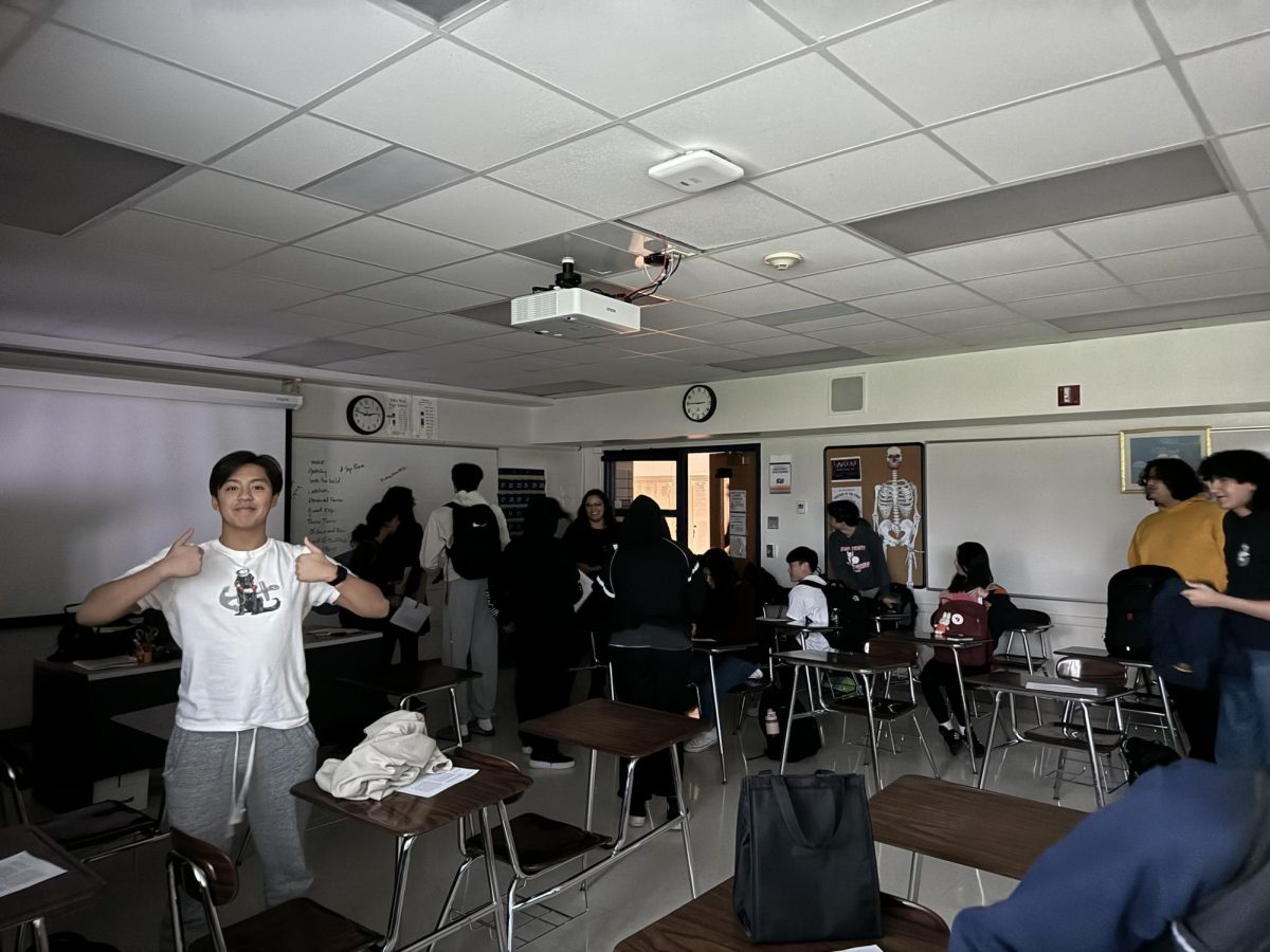 Students in 8th period AP Literature wait in their classroom for the power to come back on. 