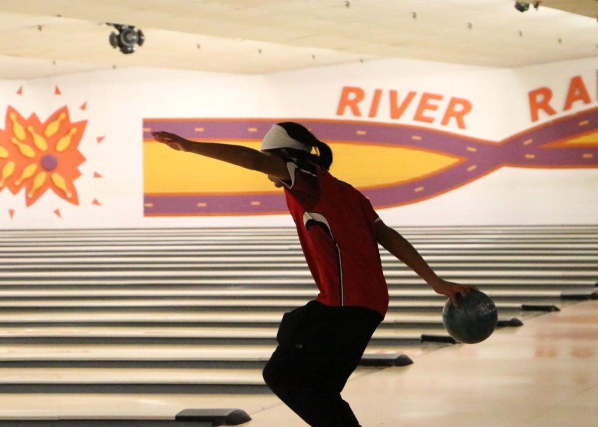 Justin Joseph, senior, aims the ball down the lane. 

