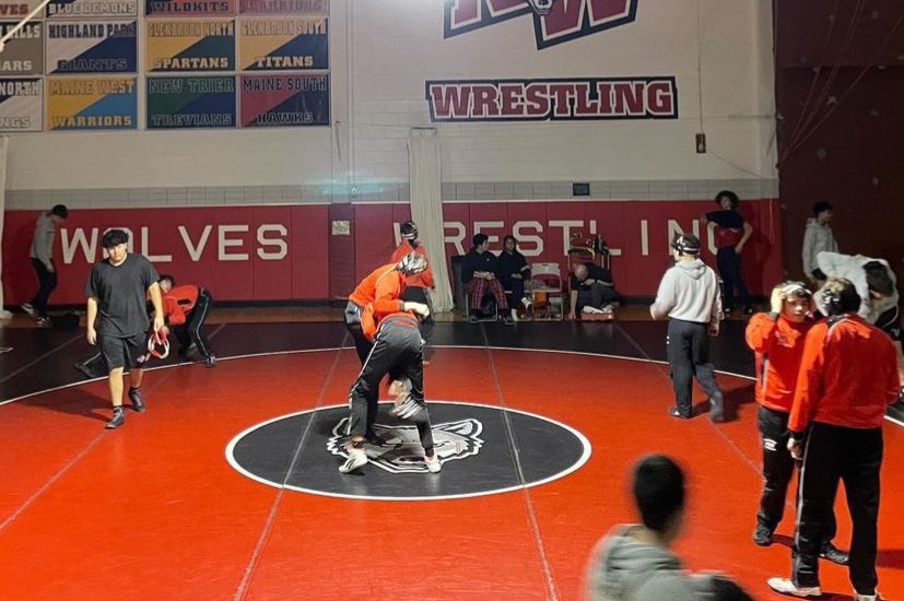 Boys+wresting+match+taking+place+in+the+Niles+West+wrestling+gym.+