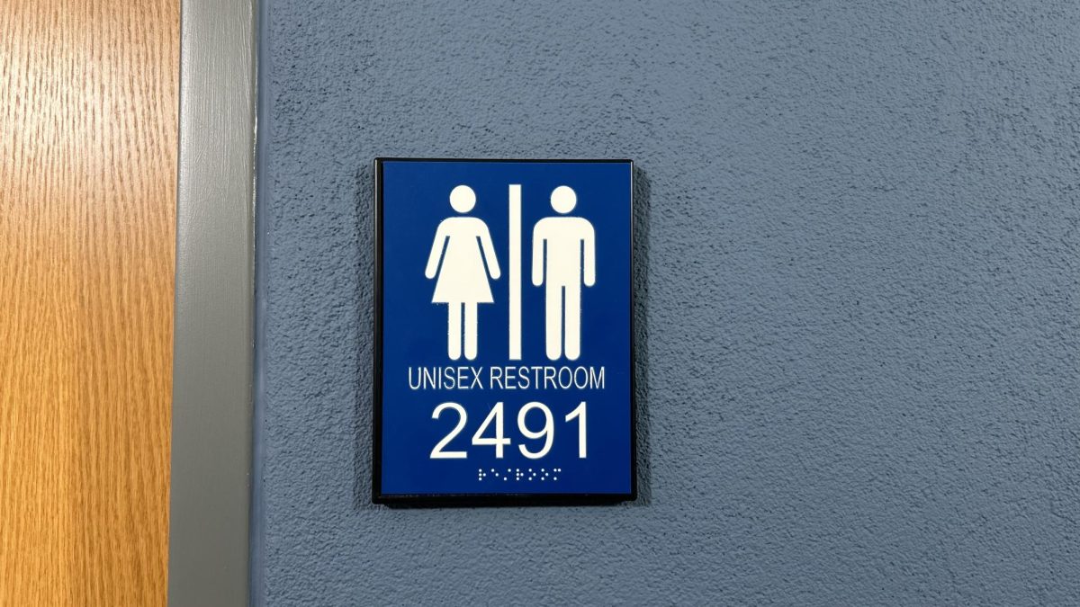 The sign outside the new unisex bathroom