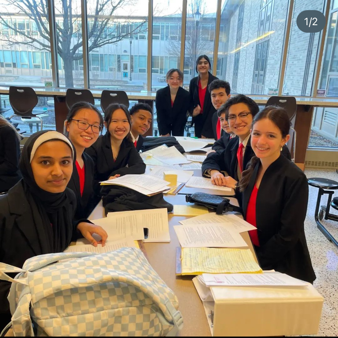 The Niles West Mock Trial Team preps for their competition, at which they placed fifth out of 18.