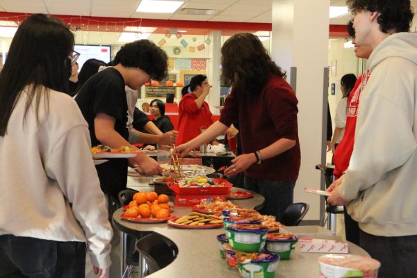 Students commenced the celebration and gathered to eat traditional dishes.