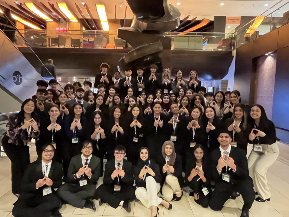 Students represent DECA pride at state competition.