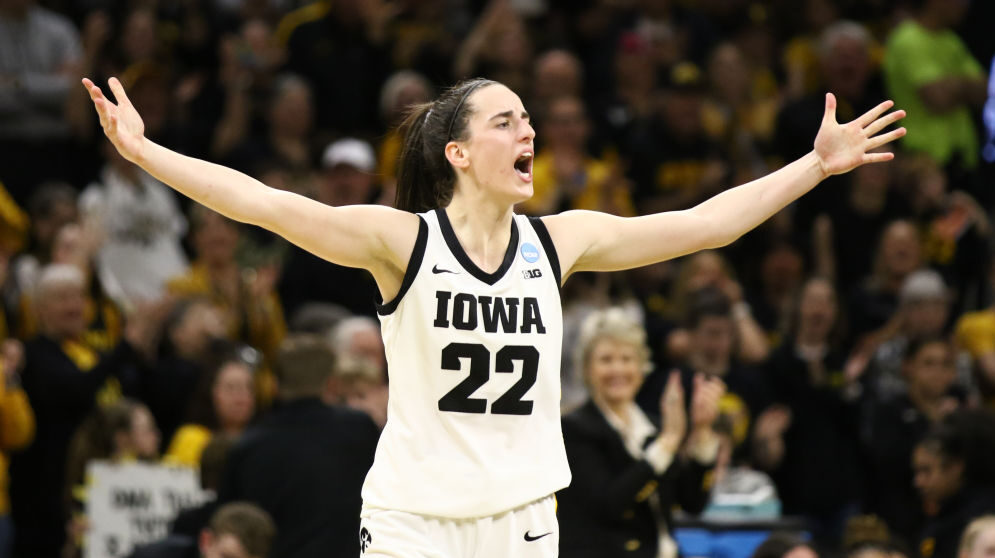 IOWA CITY, IOWA- MARCH 25: Guard Caitlin Clark #22 of the Iowa Hawkeyes celebrates after drawing a foul late in the second half against the West Virginia Mountaineers during their second round match-up in the 2024 NCAA Division 1 Womens Basketball Championship at Carver-Hawkeye Arena on March 25, 2024 in Iowa City, Iowa. (Photo by Matthew Holst/Getty Images)