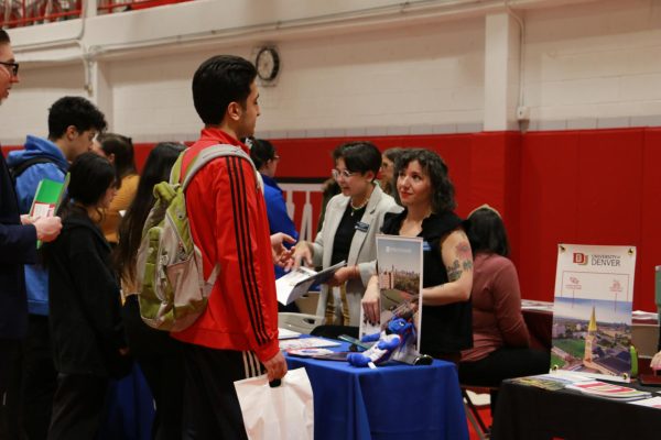 Students talk to colleges to ask questions and see if they would be interested in their programs.