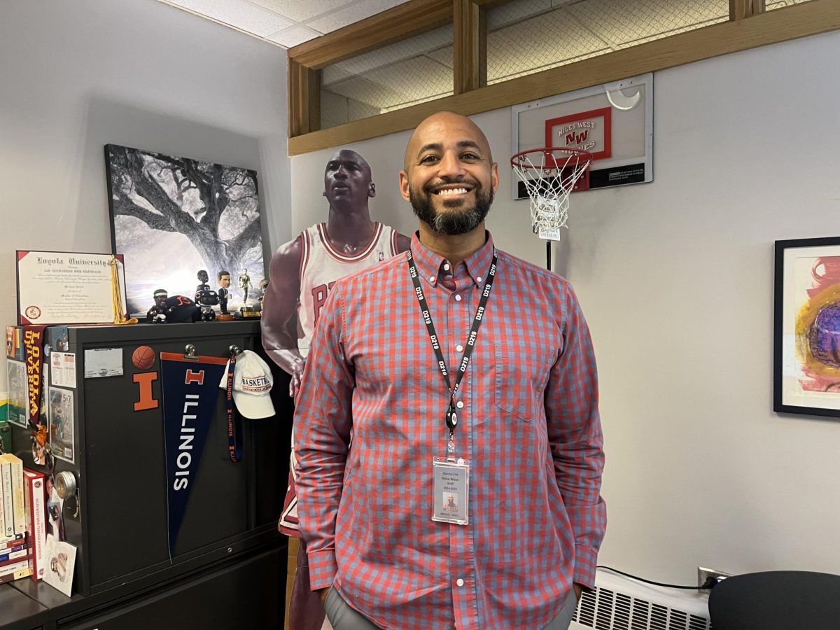 Counselor Micheal Sneed stands in his new office.