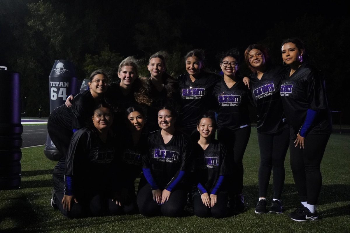 Niles North Dance Team poses as they get ready for their halftime performance.