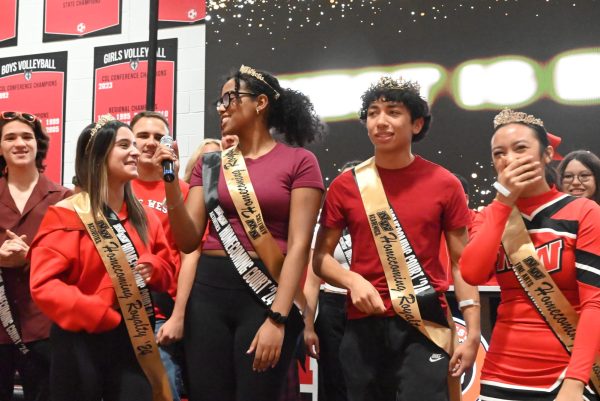 From left, Mehmeti, Endashaw, Grant, and Cronologia celebrate after winning homecoming royalty. 