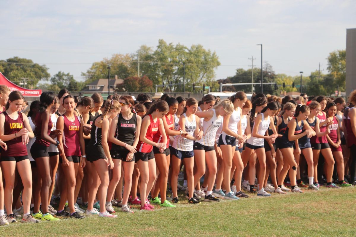 Freshmen and Sophomore girls from all over Illinois get ready at the start, setting their watches for their three mile journey.