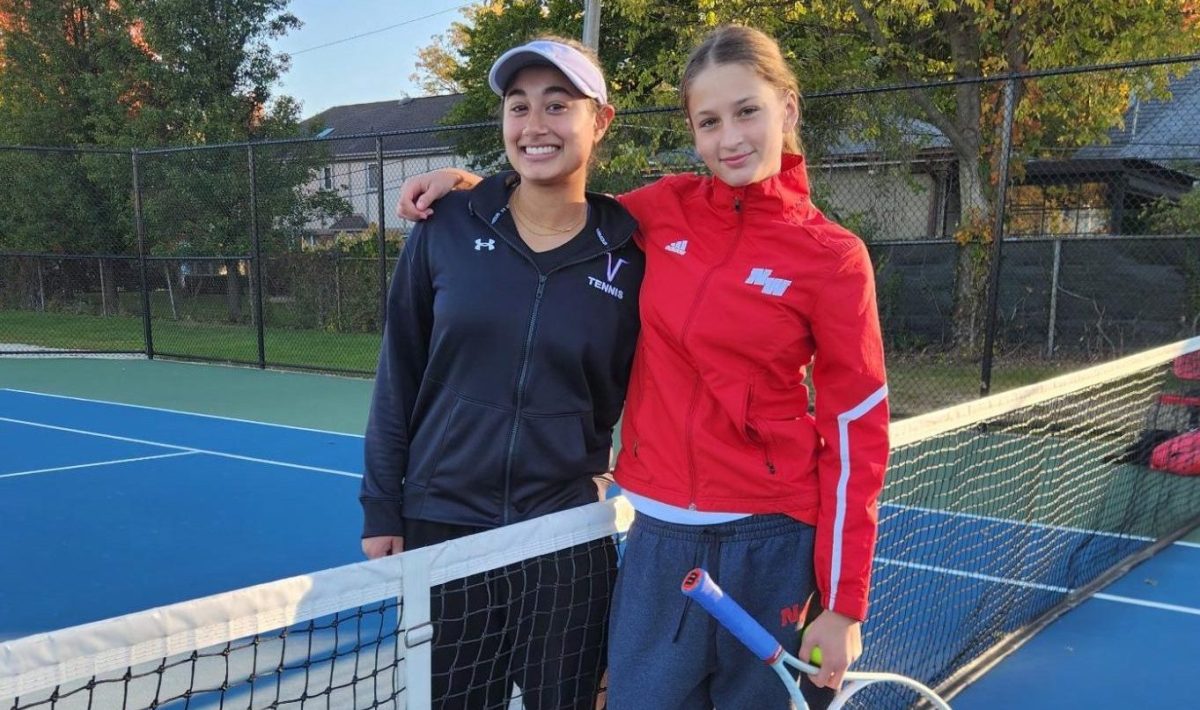 Freshman Emma Velimirovic (right) poses with Niles North senior Sobia Shethwala. Both varsity tennis players made it to State.
Photo courtesy of @NiWeHiTennis on X.