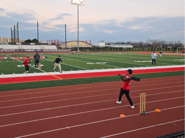 During the first home match in Niles West Cricket history, the two lead-off batsmen, senior Shayan Zeeshan (left, in red) and senior Zain Mahfooz (right), lead the team in runs against the Maine East Blue Demons.

The two played a huge role in the team's victory.