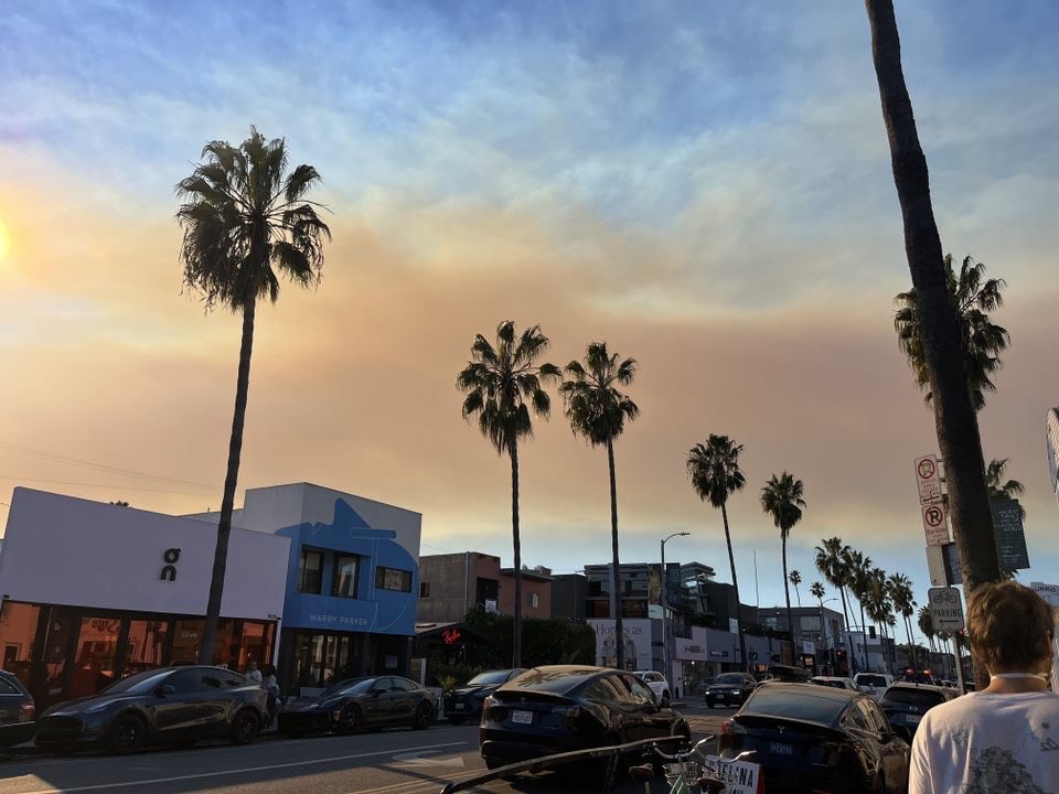 Smoke sits over Venice Beach in Los Angeles county, photographed by resident Justine Elizabeth Larsen.