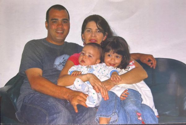 Parents Gabriel (left) and Lisa Estrada-Giraldo (right) with their children Juanita (right) and Alejandro Estrada-Giraldo (left). 