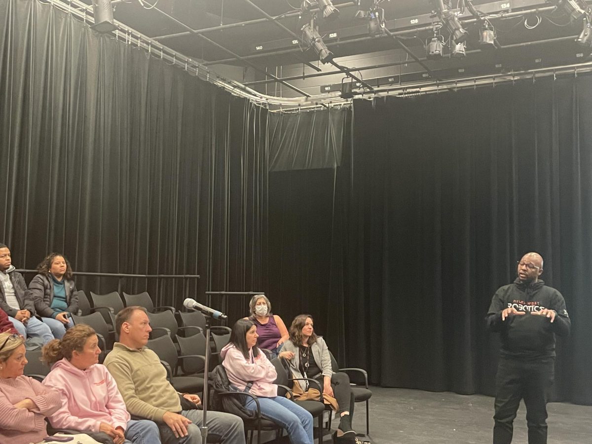 Principal Christian answers a question from a parent from the 2024 State of The School meeting. 