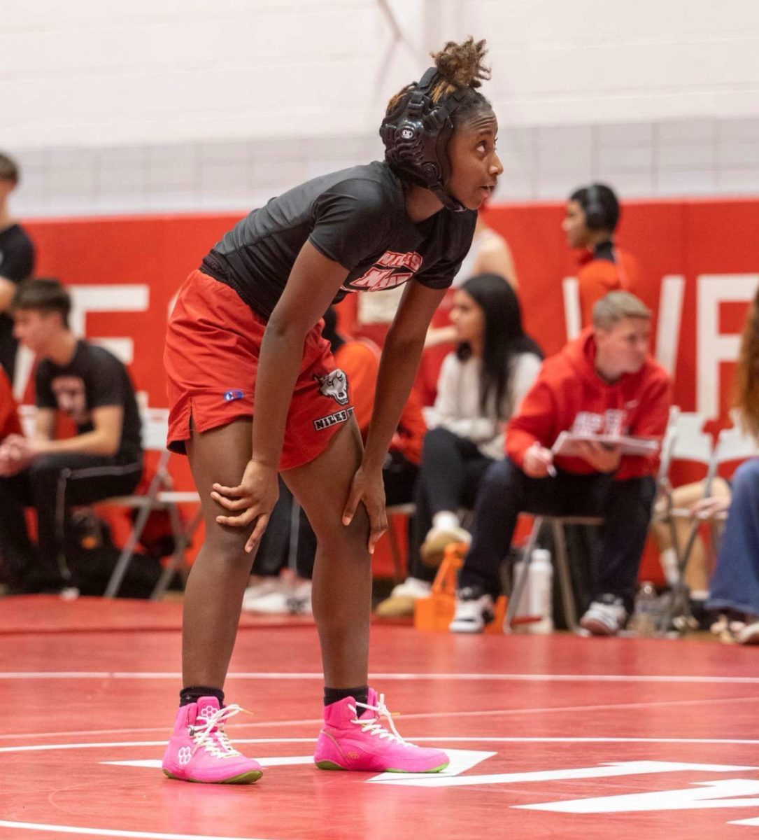 Freshman Chinyari Parrish gets ready for a match at practice.