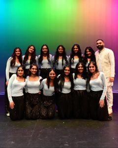 Niles West Bollywest, a cultural dance team, poses for a photo after their SASA Night performance.