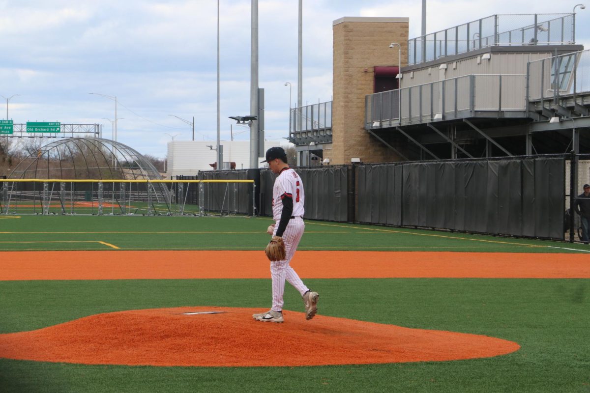 Going up to the mound, senior Yacoub Rayan gets ready for his next pitch. 