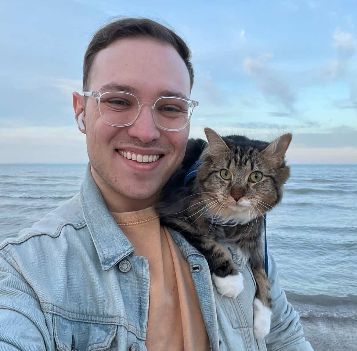 Sam Rosenfeld pictured with his cat, Suki. Photo provided by Amelia Gottschalk