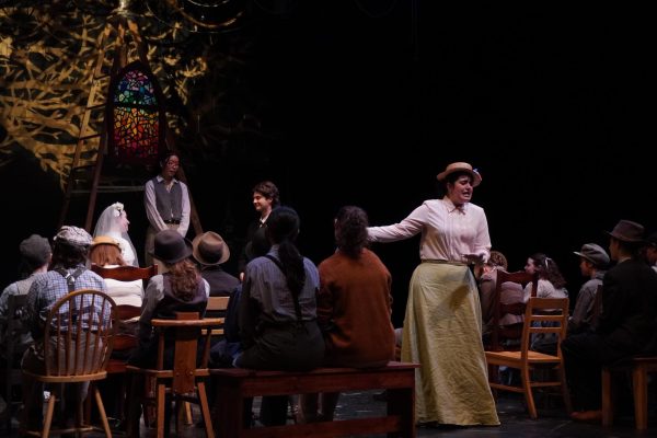 Mrs. Soames, played by senior Emma Shimon, adds some comedic relief as she cries out in church saying how much she loves weddings. 