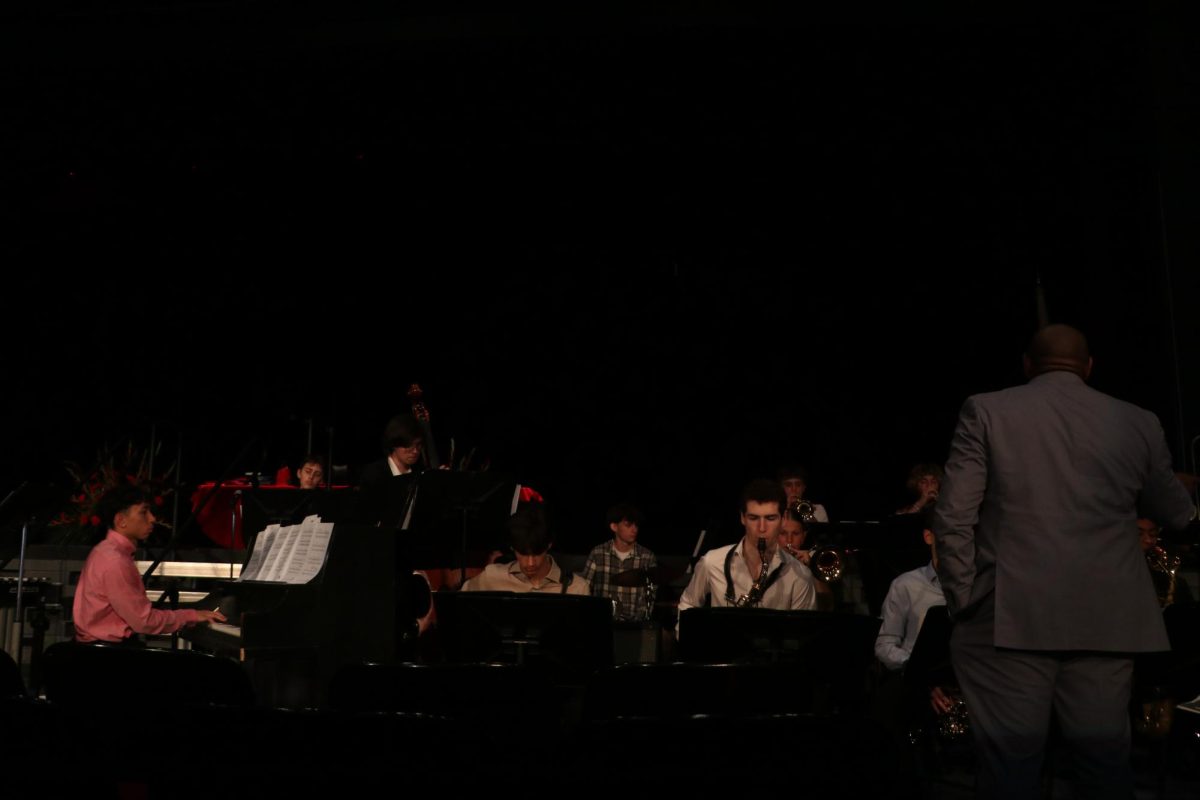 The Niles West jazz band performs to welcome guests into their seats. 