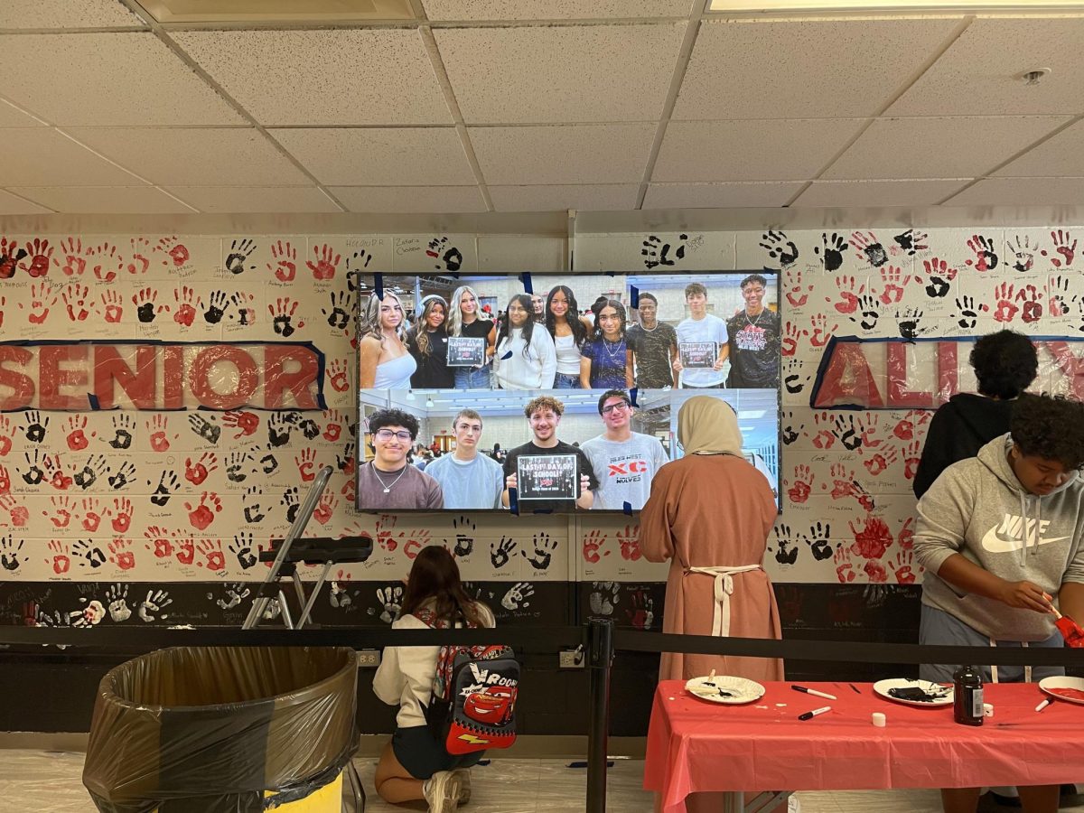 The handprints all over the wall starts to come together as 9th period wraps up.