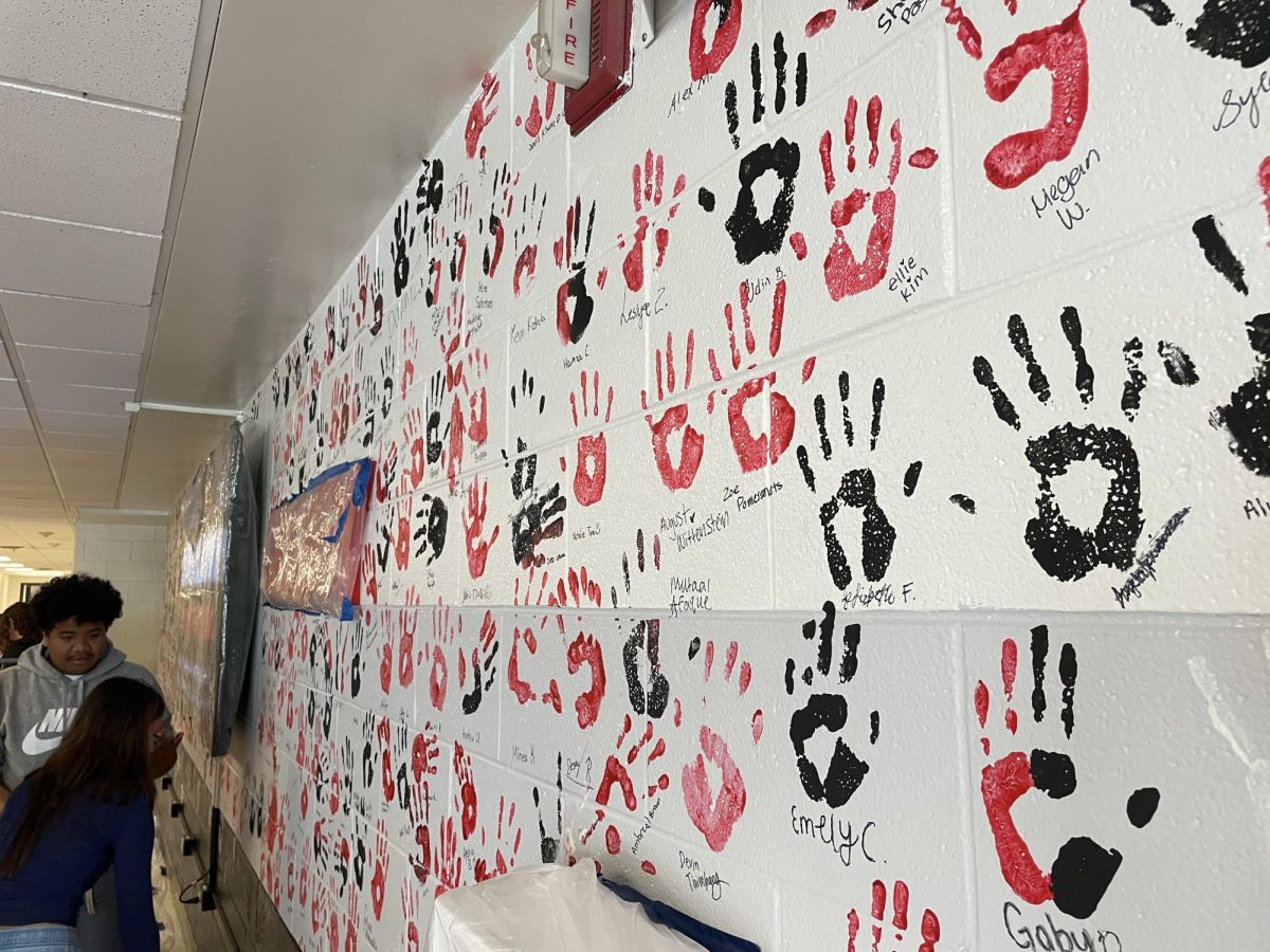 Several handprints were imprinted along the hallway as a symbol for each senior. 