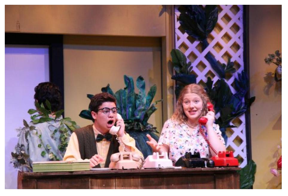 Theatre teacher Lorelei Wernecke (right) performs alongside Jake Pranian in Niles West Theatre's October 2019 production of "Little Shop of Horrors." Wernecke was a senior at the time.