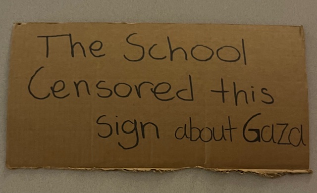 The sign Hedayat carried around Monday, Sept. 8. 