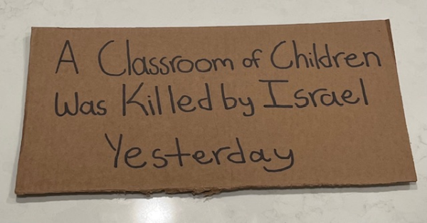 The sign Hedayat carried around Friday, Sept. 5. It is roughly the size of a standard piece of paper. 