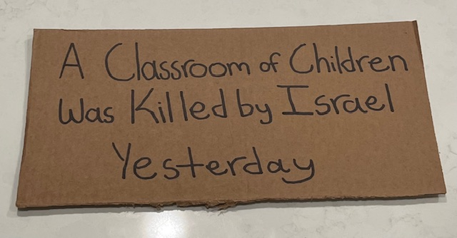 The sign Hedayat carried around Friday, Sept. 5. It is roughly the size of a standard piece of paper. 