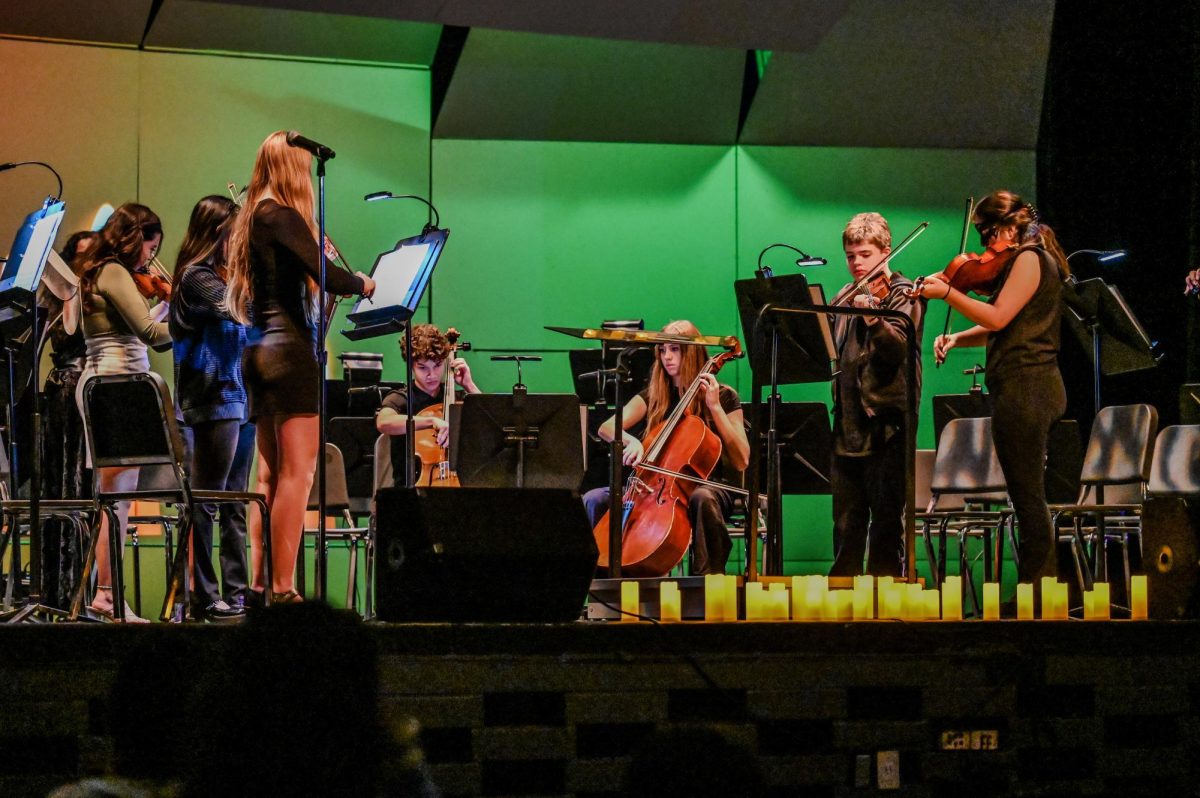 Niles West Orchestra performs with they're passion for music, embracing they're talents they've learned.