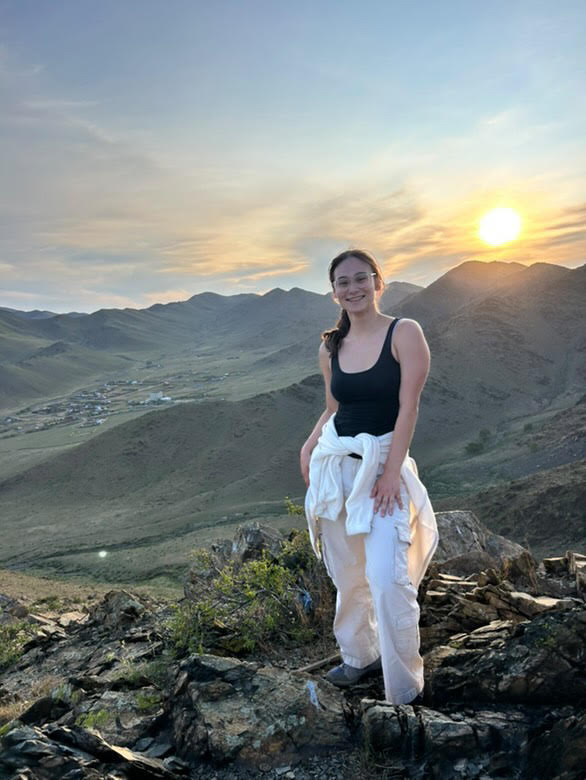 Peace Corps volunteer and D219 Alumni Lauren Hersch (class of 2021) stands in the mountains of Mongolia, where she was stationed by the Peace Corps.