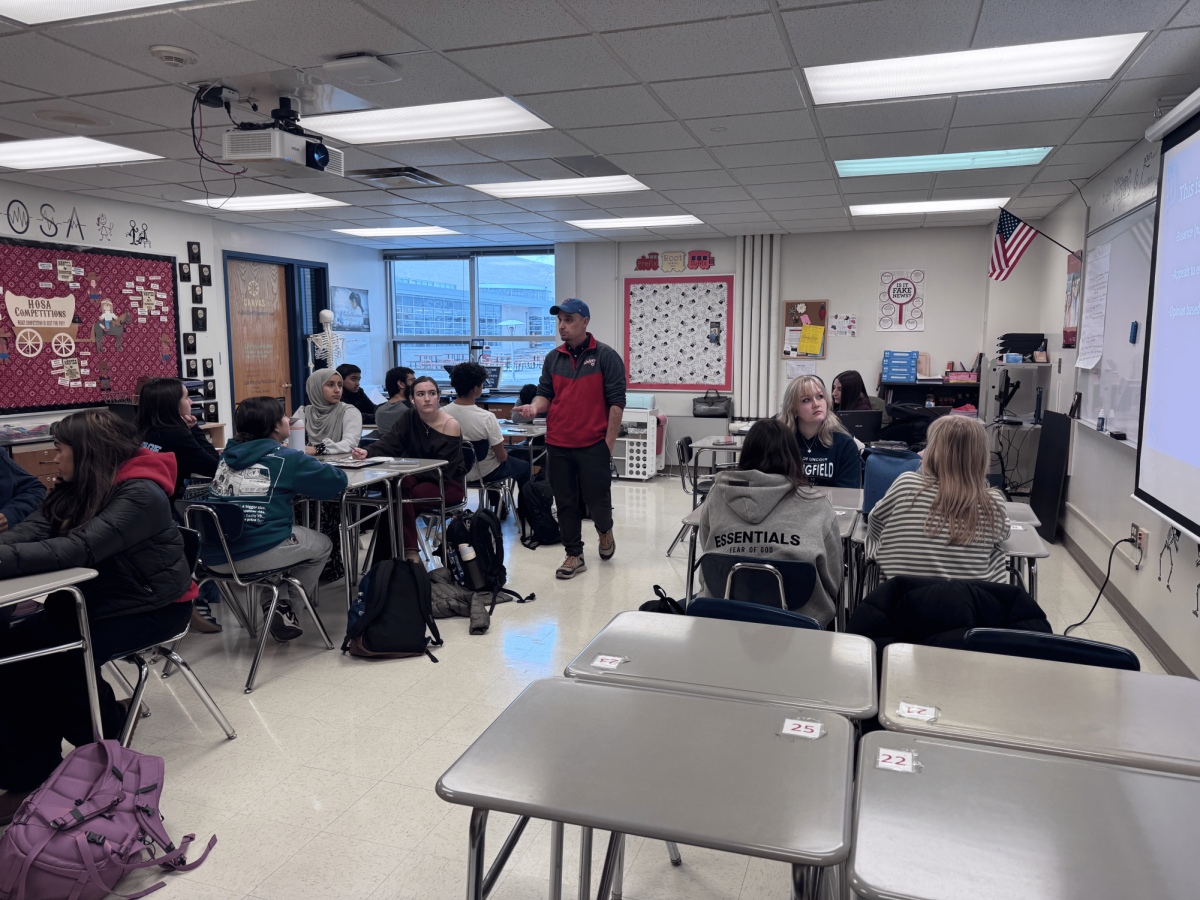 Science teacher Michael Page co-teaches AP Seminar with English teacher Kristen Jackson. Students who take AP Seminar formerly earned a public speaking credit.