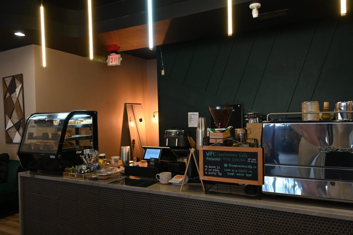 The register sits next to the case of pastries and the espresso machine. In addition, all of the wifi information is very easily accessible next to the register for customers who want to spend their time at the cafe working.