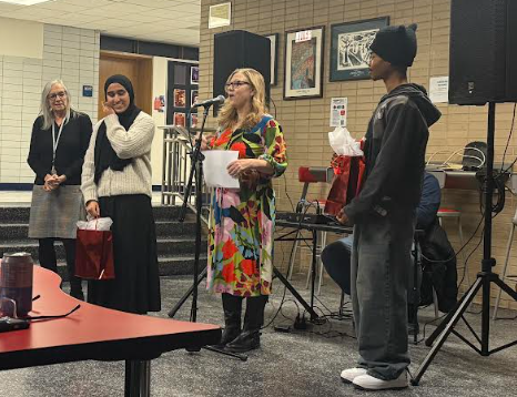 At Poetry Out Loud, English teacher Sharon Swanson (far left), senior Salwa Mohiuddin, English teacher Sally Graham and Senior Jaden Conley prepare for the next round of the competition.