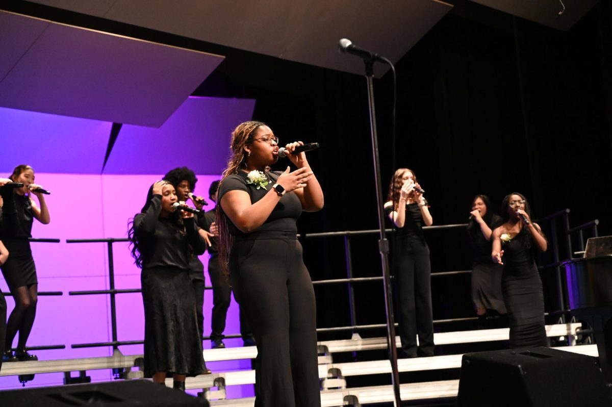Michelle Adefala, senior, sings her solo part of "Diamonds" by Rihanna.