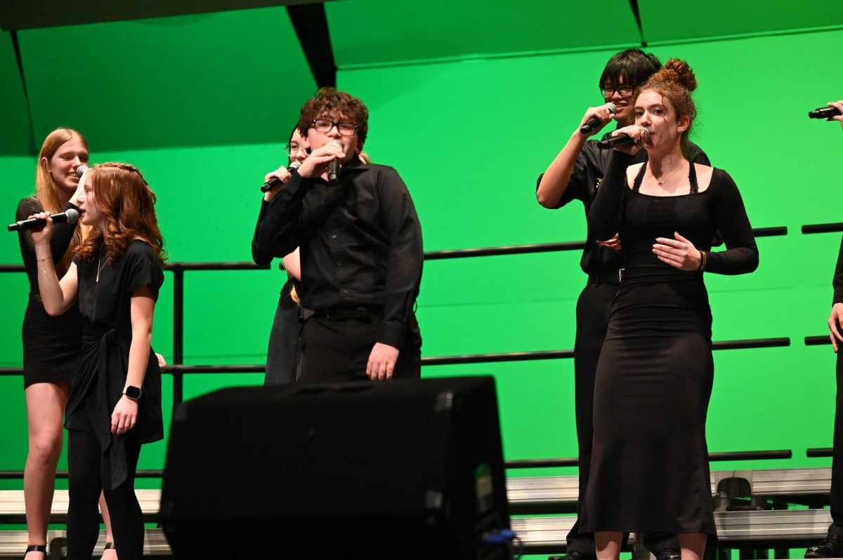 From left to right, Keilia Silva, sophomore, Paolo Torricelli, freshman, Annabelle Macejak, junior, performs "All I wanted" by Paramore.